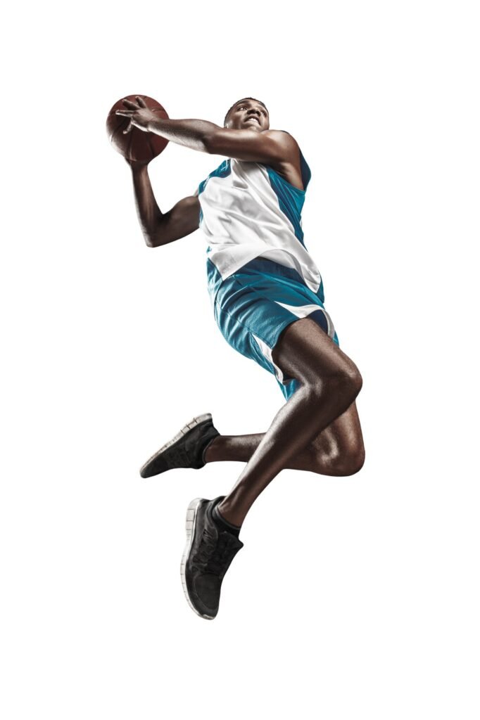 Full length portrait of a basketball player with ball